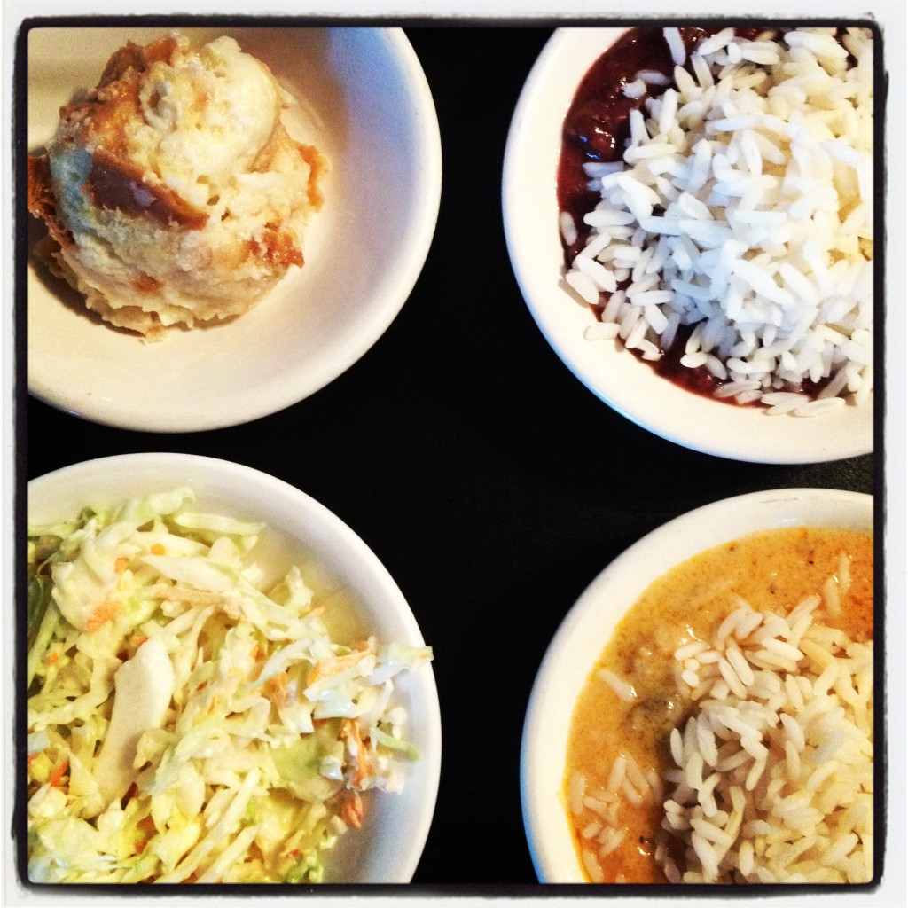 Papa's unlimited sides. Clockwise from the top-left: Bread pudding, Red beans and rice, Mushroom etouffee and slaw